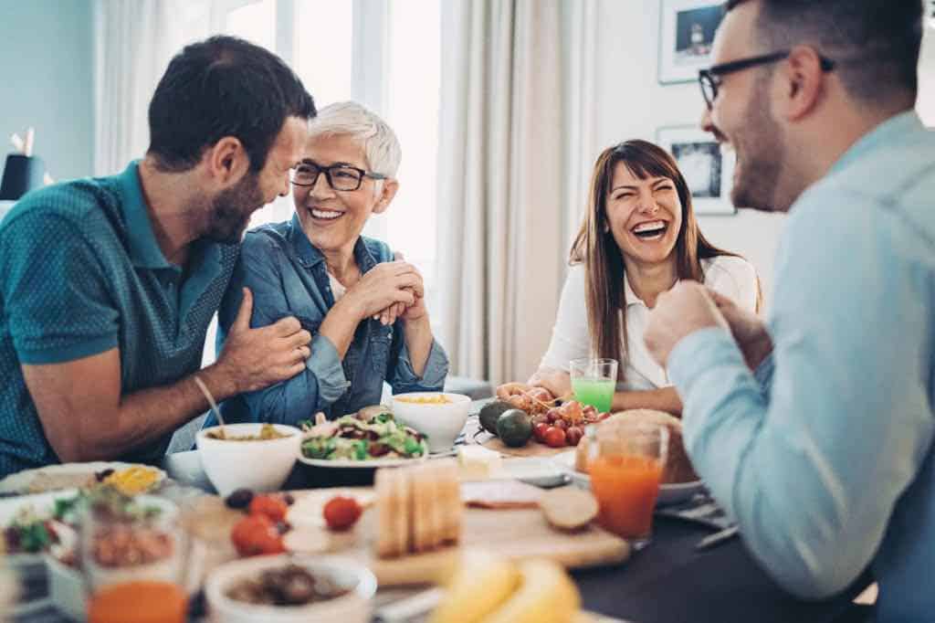 brother and sister setting healthy boundaries with parents at the dinner table