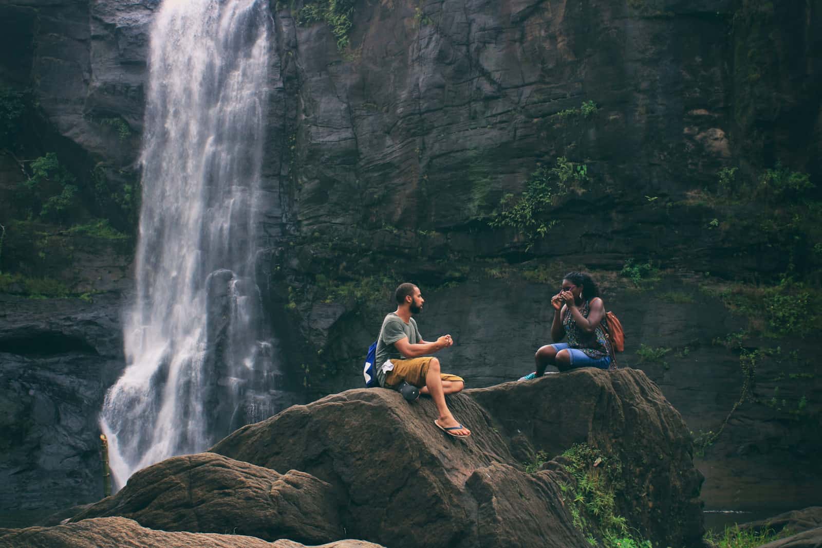 couples hanging out together in a hike